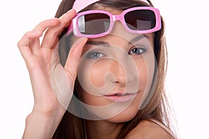 Model in pink sun-glasses photo