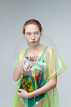 Model posing in plastic clothes taking part in social campaign