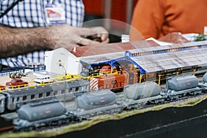 Model railroad. Lots of trains on station.