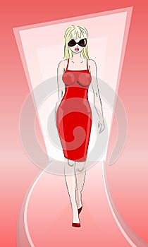 Model in red dress on catwalk