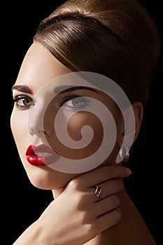 model with retro make-up, hairstyle & jewelry