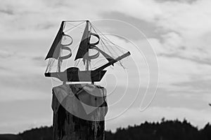 Model Ship Mounted To Docking Post