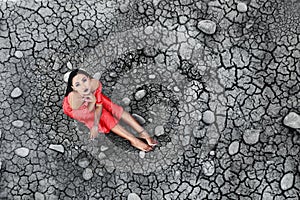 The model sits on the dried soil