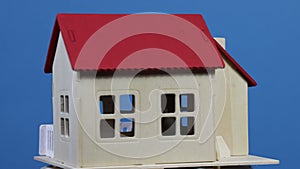 Model of small familly house rotating. New home concept
