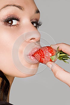 Model with strawberry