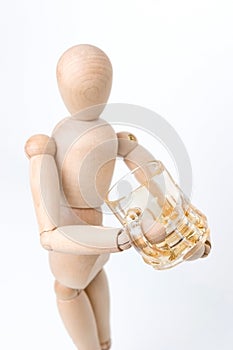 Model taking a drink from beer mug