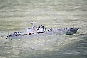 Model of the torpedo boat floats in the basin