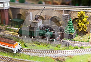 Model of train on railstation.