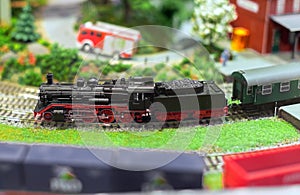 Model of train on railstation.