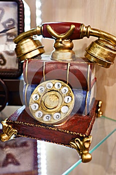 Model of vintage telephone with dial