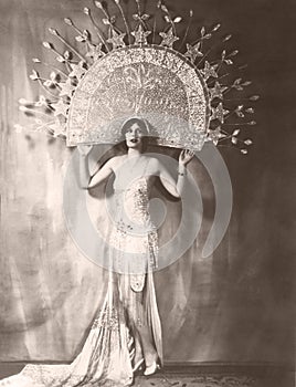 Model wearing large headdress