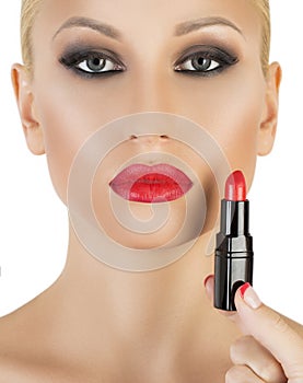 Model on white background applying red lipstick