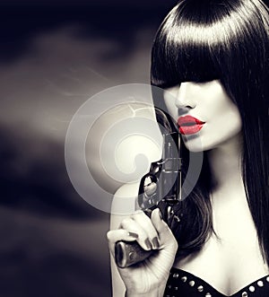 model woman with a gun