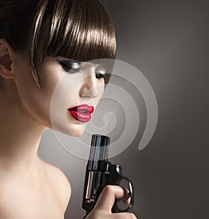 model woman with a gun