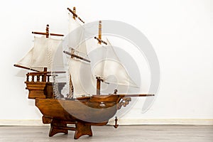 Model of Wooden Sailing Ship for decoration. Classic and vintage sailboat style. Vessel model. The Fenix brigantine