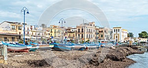 fishermens boats at the beach in the center of Mondello photo