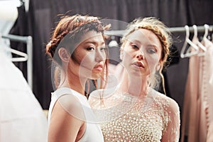 Models getting ready backstage at the New York Life fashion show during MBFW Fall 2015