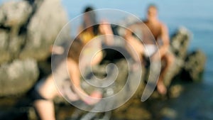 Models on photoshooting on rocks