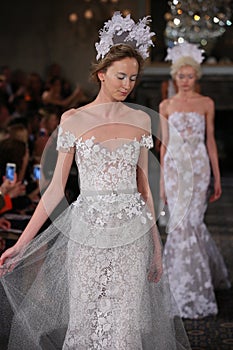 Models walk the runway finale at the Mira Zwillinger Spring 2015 Bridal collection show