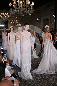 Models walk the runway at the Mira Zwillinger Spring 2015 Bridal collection show