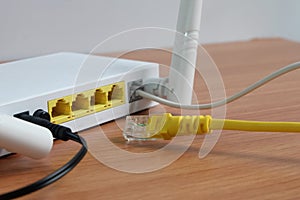 Modem router wifi wireless connect lan cable On wooden