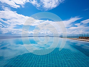 Moden type infinity swiming pool with blue sky