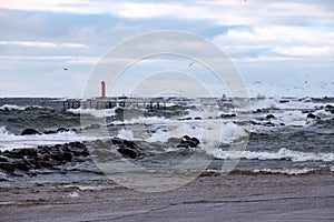 moderate storm in baltic sea near lighthouse