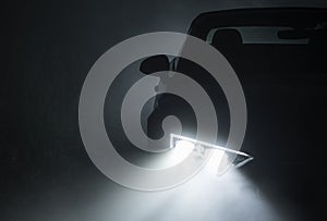 Modern Active Car LED Headlights Performing in Fog