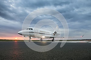 Modern advanced private business jet ready to take off