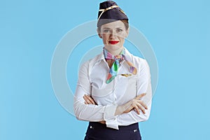 modern air hostess woman on blue in uniform