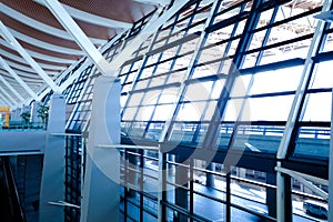 Modern airport interior glass wall aisle window