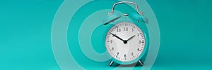 Modern alarm clock turquoise closeup object