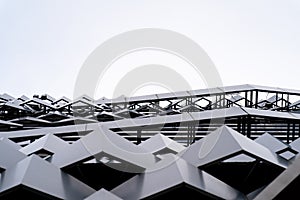 Modern Aluminium composite material architecture gray color and Hexagon shape popup texture on exterior facade building