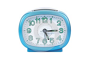 Modern analog alarm clock isolated on white background. Blue alarm clock isolated