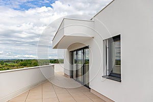 Modern apartment balcony with blue sky