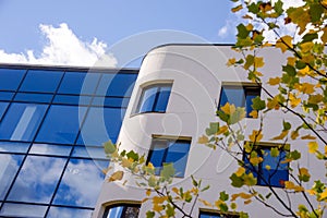 Modern apartment building on blue sky background