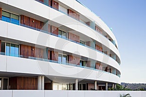 Modern apartment building with curved facade
