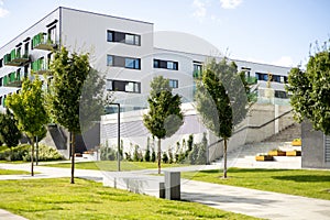 Modern apartment buildings in a green residential area in the city. Apartments in a new urban housing. Block of flats in