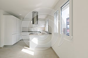 Modern apartment, empty spaces, kitchen