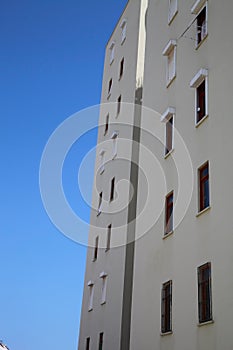 Modern apartment house on a background of the summer sky