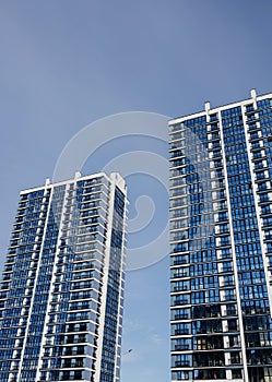 Modern apartments with blue sky background