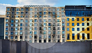 Modern apartments facade in Berlin by the Murdered Jews memorial. Contemporary building exterior with glazed facade