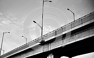 Modern architectural highway bridge black and white photo