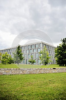 Modern architecture building full of windows during a storm