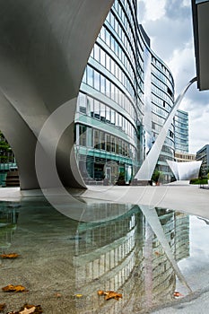 Modern architecture complex with glass building and arch in the downtown of Frankfurt am Main, Germany photo