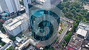 Modern Architecture Corporate Business Buildings. Bird view to blue glass skyscraper