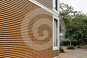 Modern architecture facade with lining of wood slats