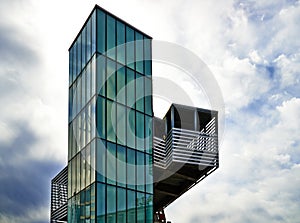 Modern architecture - green glass elevator