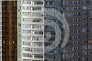 Modern architecture with a lot of square glass windows and colors on the building.