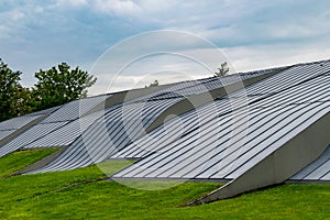 Modern architecture low metal roof grass